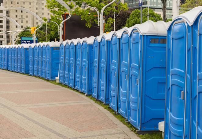 portable restrooms lined up at a marathon, ensuring runners can take a much-needed bathroom break in Highland